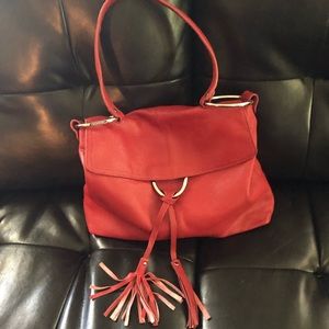 Alfani red caviar leather purse with tassels